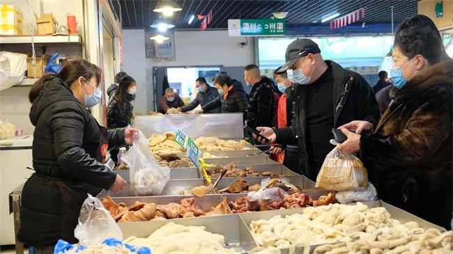 年味不减防疫不松!瓯海年货市场强化疫情防控