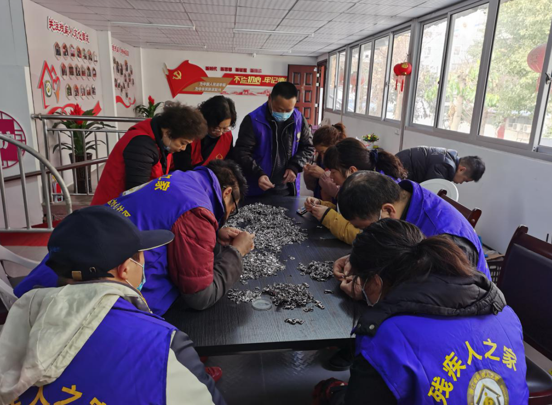 鹿城:手拉手心连心 寒冬助残暖人心